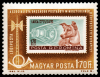 Lajkát ésa Szputnyik-2-t ábrázoló román bélyeg egy magyar bélyegen